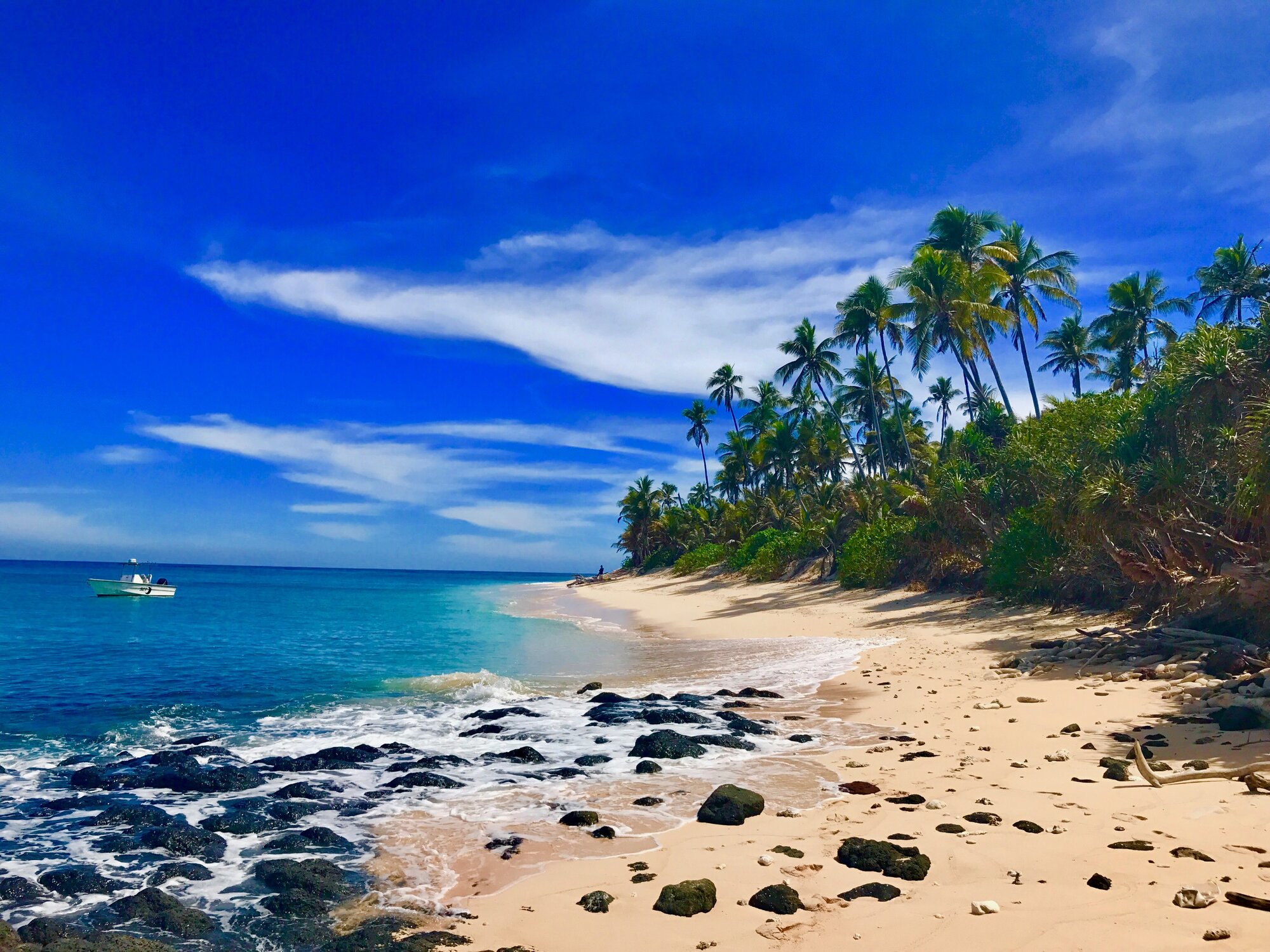 Eori beach shoreline with turquoise shallows