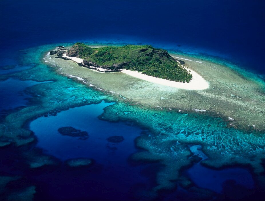 Aerial view of Eori Island and its fringing reef in the Mamanuca Islands, Fiji