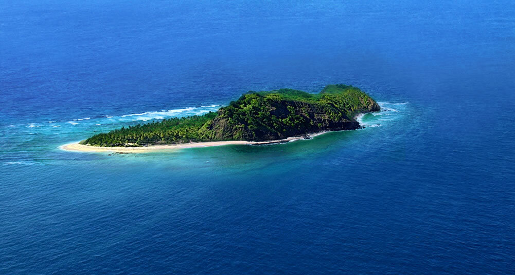 Aerial profile of Eori Island with palm spit and rocky ridge