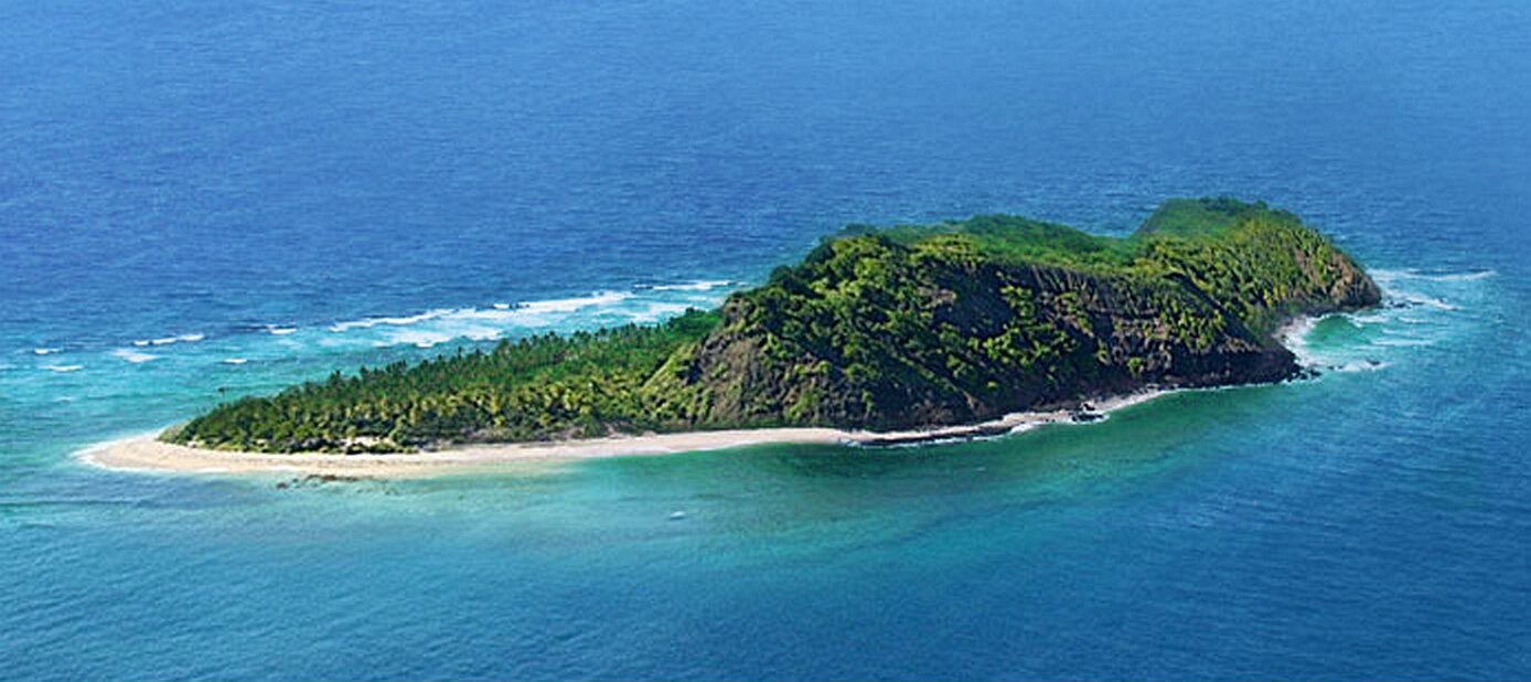 Aerial of Eori’s palm grove tip and reef shelf
